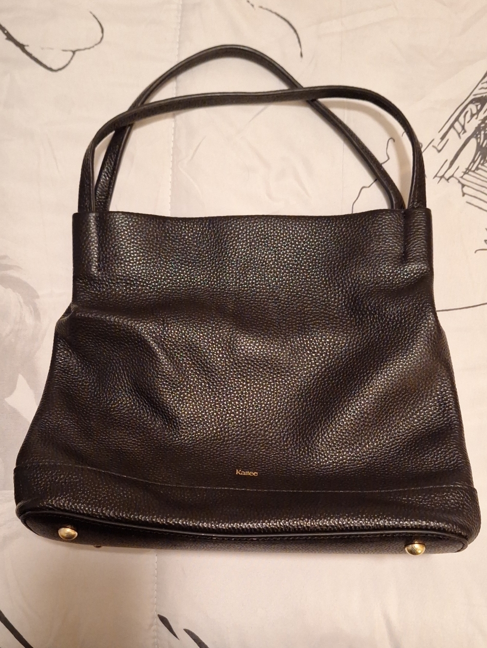Black Pebbled Leather Shoulder Bag with Gold Accents